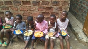 Children eating a meal.